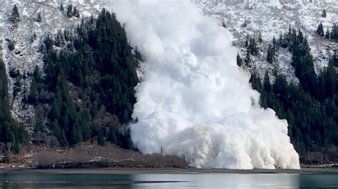 Man-made avalanche roars down mountainside