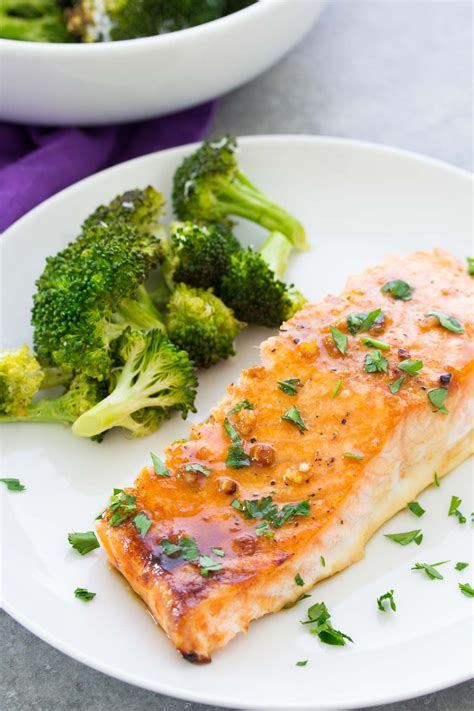 The best easy oven baked salmon recipe! The salmon is cooked in a honey ...