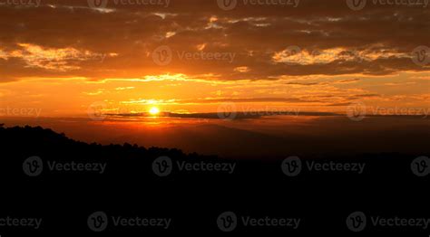 sunset sky with clouds and golden light 13841935 Stock Photo at Vecteezy