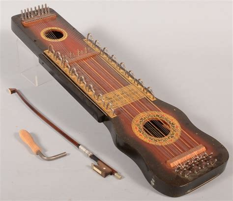 816: "UKELIN" Wooden Stringed Instrument in Box. Labele