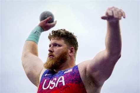 American Ryan Crouser wins third straight Olympic gold medal in shot put