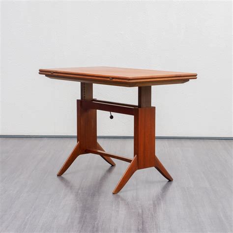 Height adjustable & extendable teak coffee / dining table by Wilhelm ...