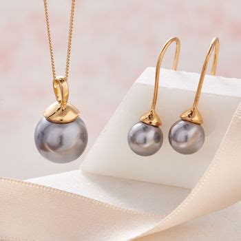 pearl necklace and earring set in gold by claudette worters | notonthehighstreet.com