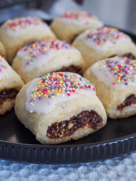 These cucidati have a delicious fruit filling wrapped in a buttery cookie with a flourish of ...