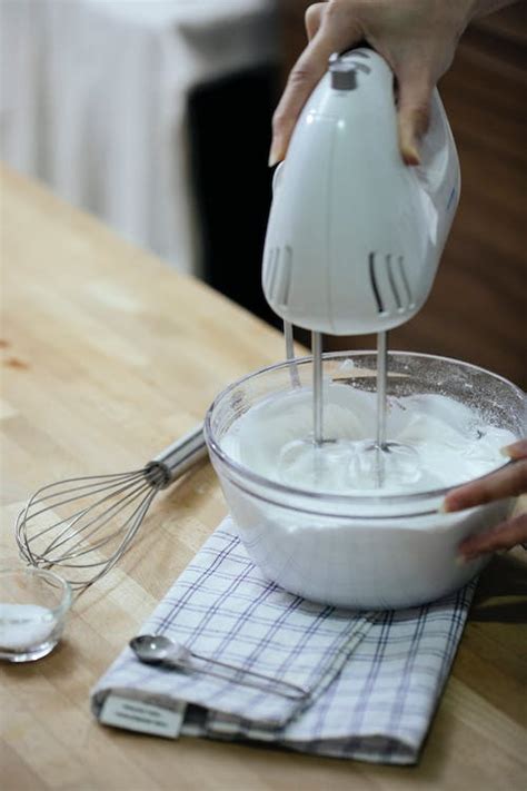 Beating of Egg Whites using Hand Mixer · Free Stock Photo