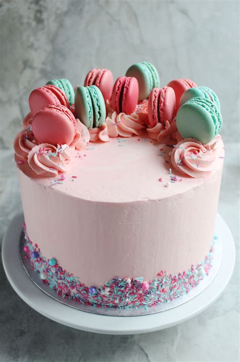 Pink baby shower cake topped with macarons and sprinkles | Pastalar, Tatlı, Fondan pastalar