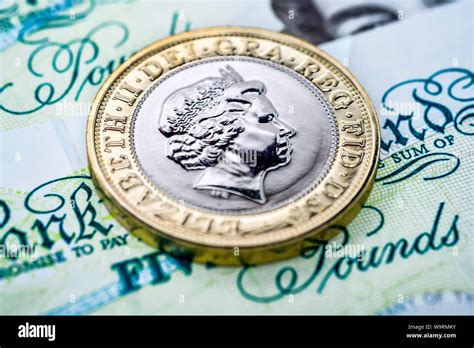 English pound coins banknotes england hi-res stock photography and ...