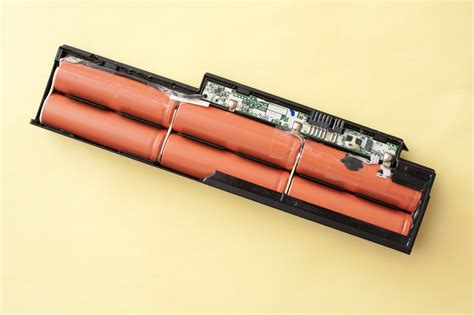 Free Stock image of Disassembled laptop battery on yellow background ...
