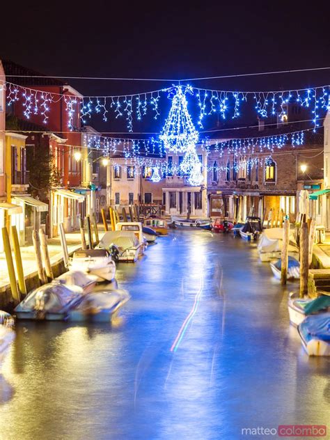 Matteo Colombo Travel Photography | Canal with Christmas lights at night, Burano, Venice | Stock ...