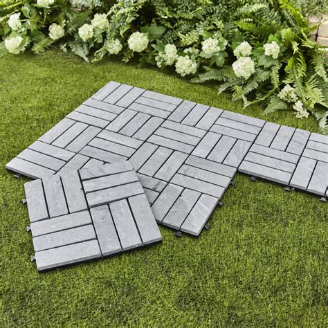 The Interlocking Stone Deck Tiles - Hammacher Schlemmer