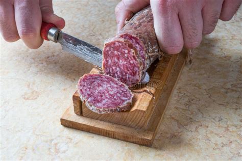 Slicing salami stock photo. Image of italian, typical - 77125968