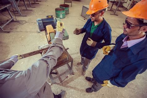 Premium Photo | Workers in industrial factory