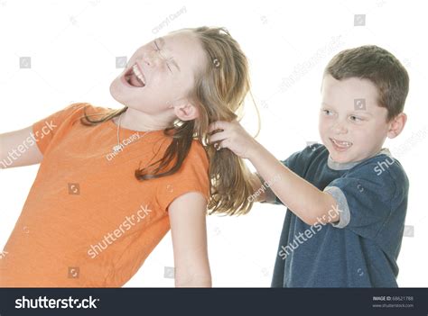 Young Boy Pulling Girl'S Hair Stock Photo 68621788 : Shutterstock