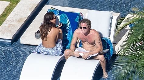 Brad Pitt sunbathes with topless girlfriend Ines de Ramon in Mexico amid 'semi-retirement' plans ...