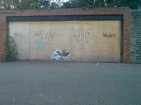 Boarded up garage graffiti | Aimee Steen | Flickr