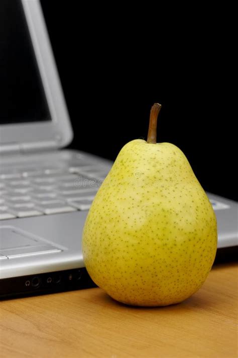 Pear,pen and laptop. stock photo. Image of food, sweet - 11834334