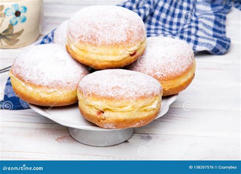 Traditional Polish Donuts with Powdered Sugar on Wooden Background ...