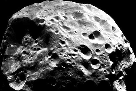 Hyperion 'Cosmic Hamburger': Strange Moon Of Saturn With Even Stranger ...