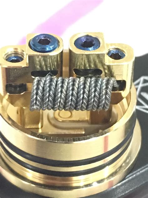 Zipper coil 2(2x26g) with 2x36g helix Nicr80. 6 wraps on 3mm, reading .24ohms and vaping ...