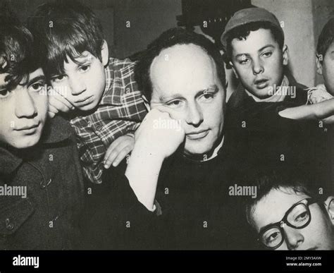 Italian catholic priest Don Lorenzo Milani with the Barbiana boys, Italy 1967 Stock Photo - Alamy