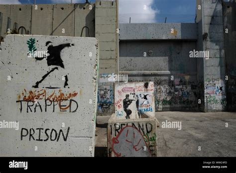 A section of the separation barrier or wall built by Israel covered ...