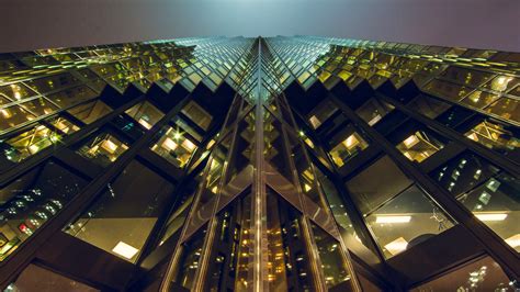 Picture of Looking Up at a Skyscraper at Night - Free Stock Photo