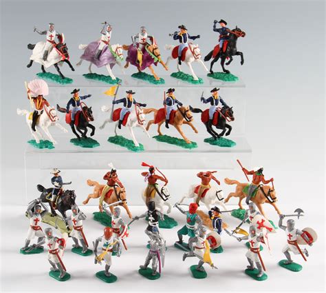 A collection of assorted plastic figures, mostly by Timpo, including ...