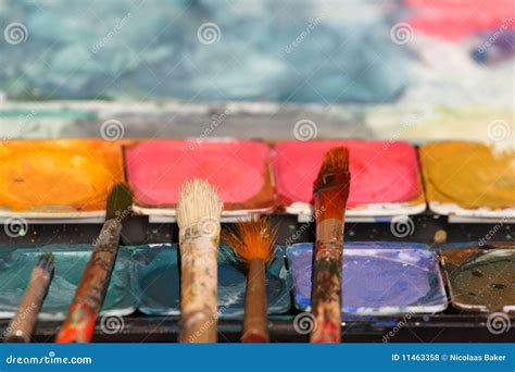 Paint Brushes on Watercolors Stock Photo - Image of craft, messy: 11463358