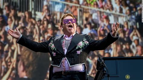 Elton John forced off stage by heavy rains in Australia - CNN Video