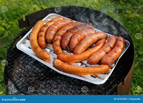 Barbecue Grill with Sausages on the Grill Stock Photo - Image of fast, aluminum: 32707054