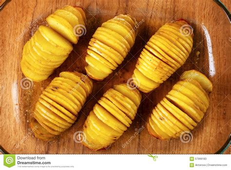 Hasselback potatoes stock image. Image of crispy, organic - 57999183