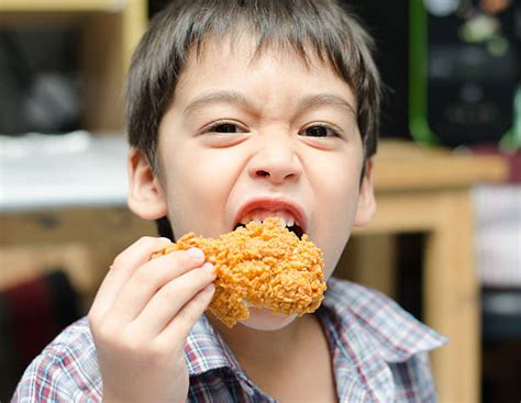 2,700+ Fried Chicken Eating Stock Photos, Pictures & Royalty-Free Images - iStock