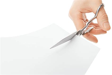 Royalty Free Cutting Paper With Scissors Pictures, Images and Stock Photos - iStock