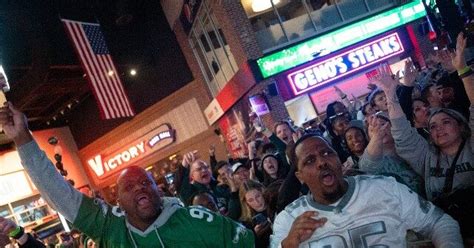 WATCH: Celebrating Philly Eagles Fans Collapse Through Bus Stop Roof ...