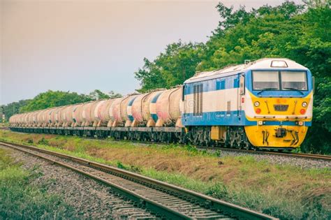 Tanker-freight Train by Diesel Locomotive at the Railway Station. Stock ...