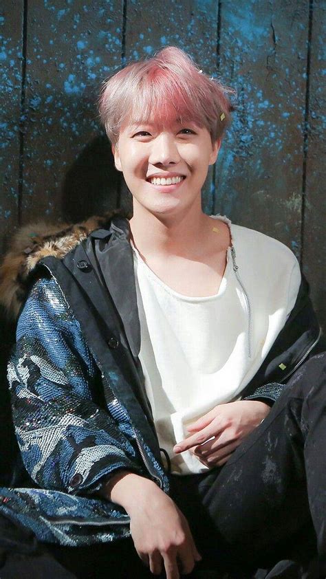 Download Cute Bts J-hope Smiling Wallpaper | Wallpapers.com