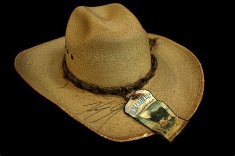 Charitybuzz: Signed Cowboy Hat from Kenny Chesney Plus T-Shirts - Lot 3269143