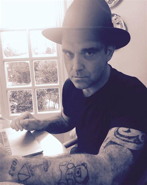 Robbie Williams tattoos: From two pairs of glasses to matching with ...