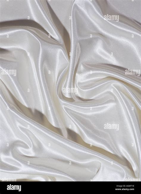 background abstract texture silk material cloth wrinkles sheets cream Stock Photo - Alamy