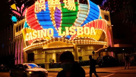 Macao sets first formal cap on casino tables, income amid bidding war - CNA