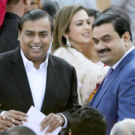 The rivalry between India's two richest billionaires, Mukesh Ambani and Gautam Adani, is about ...