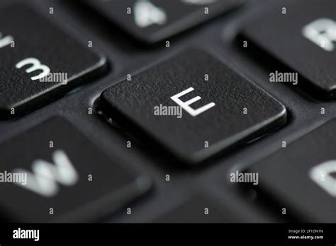 Letter E key on a laptop keyboard Stock Photo - Alamy
