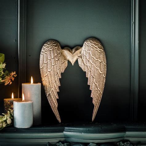 silver angel wings wall decoration by marquis & dawe | notonthehighstreet.com