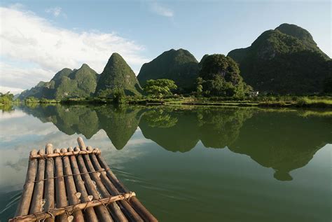 Bamboo Rafting On The Li River by Alex Linghorn