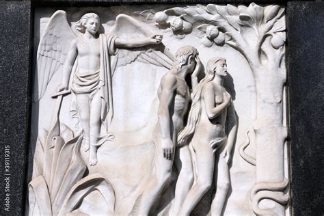 Adam and Eve - bas relief sculpture on a grave Stock Photo | Adobe Stock