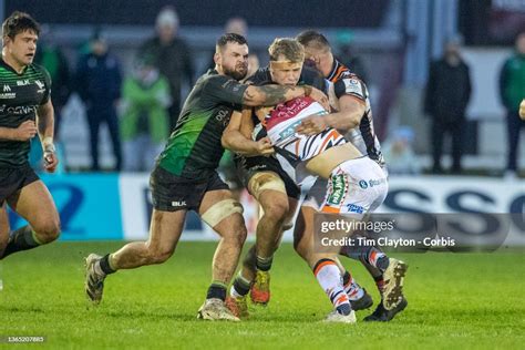 Jack van Poortvliet of Leicester Tigers is tackled by Conor Oliver of ...