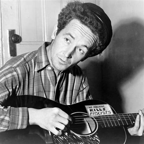 Woody Guthrie: Biography, Folk Musician, Children, Songs & Guitar