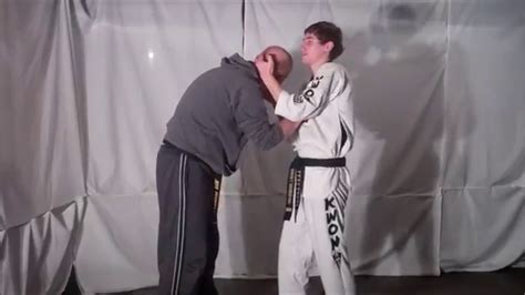 Self-Defense Technique Tuesday #148 Defense Against a Choke-Neck Crank Takedown - YouTube