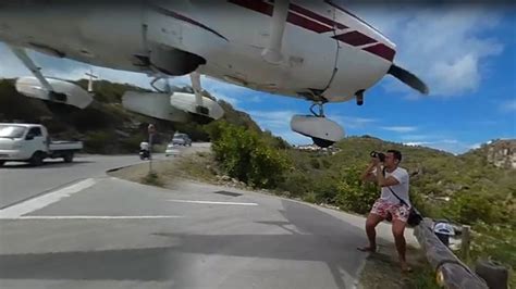 ‘It hit my hand!’: Tourist’s jaw-dropping near miss with airplane (VIDEO) — RT Viral