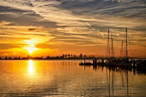 Sunrise At The Marina Photograph by Chuck Burdick - Fine Art America